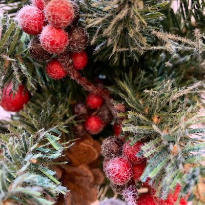 Red Berries and Greenery in Tin Pot
