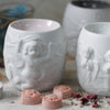 White Ceramic Wax Melter with Cherub Motif