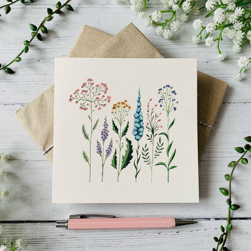 Row of Pastel Wildflowers Greeting Card